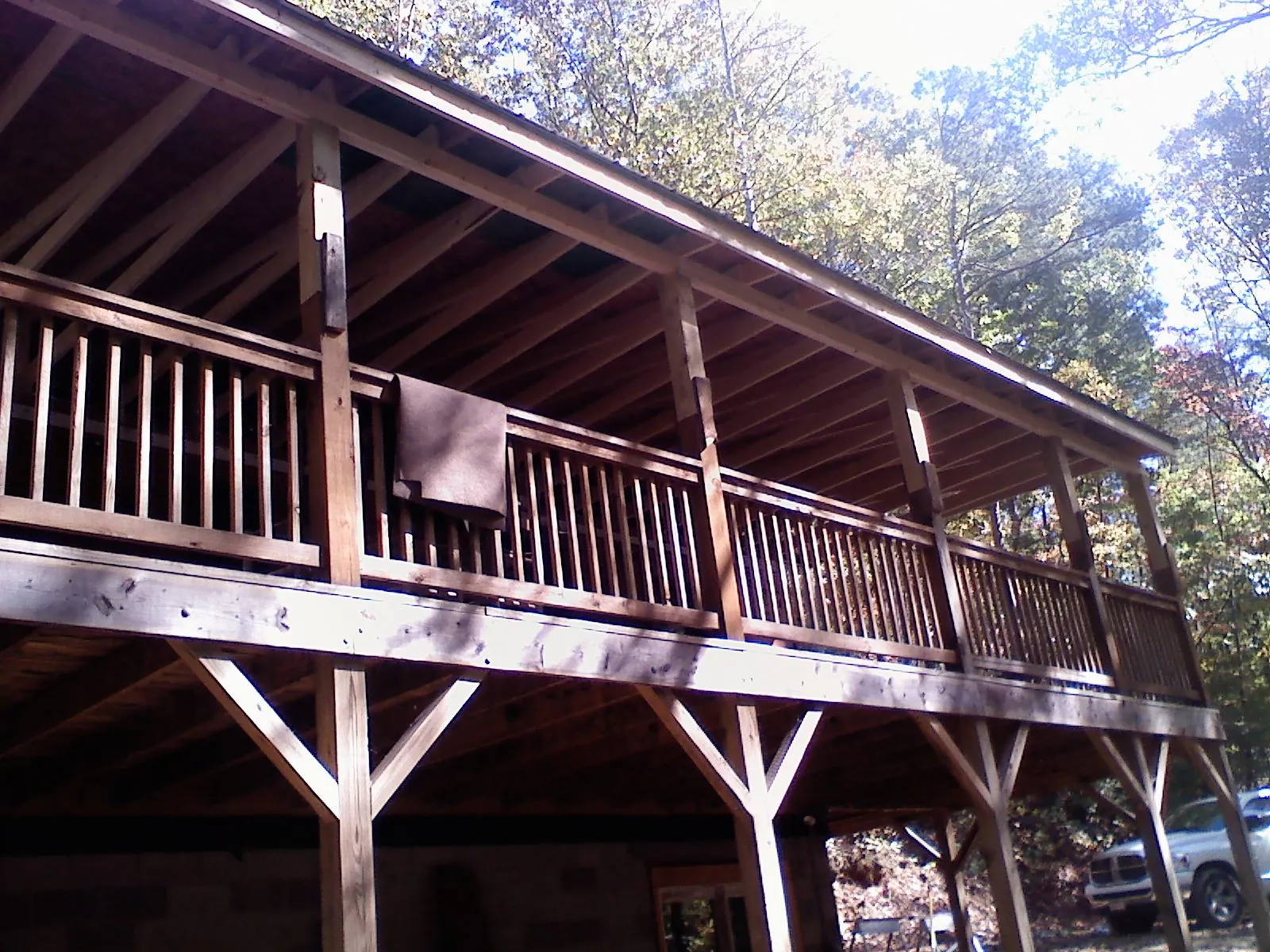 Timber framing under a new elevated porch and deck — Roof Leak Repair in Milton by Roofing Brothers